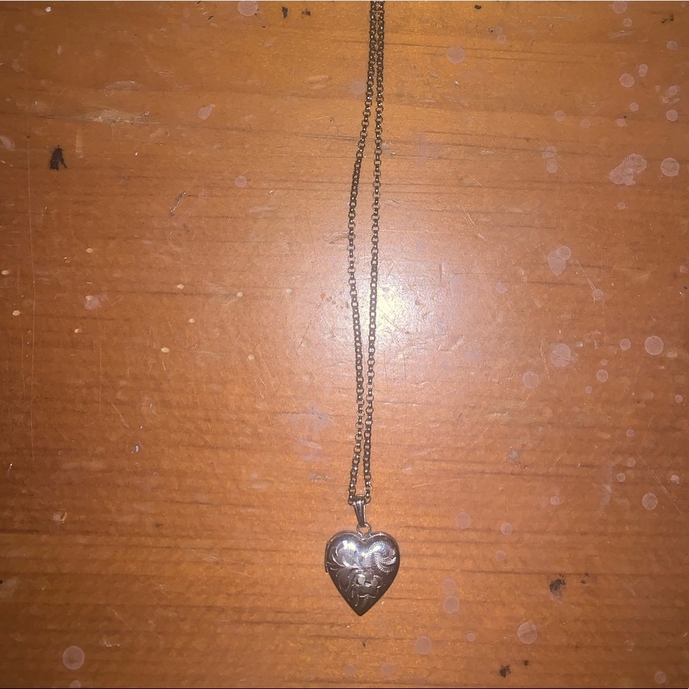 Beautiful heart locket with floral engravings